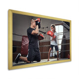 Young Trainer Training A Little Girl Boxer - Sport Boxer Canvas Wall Art