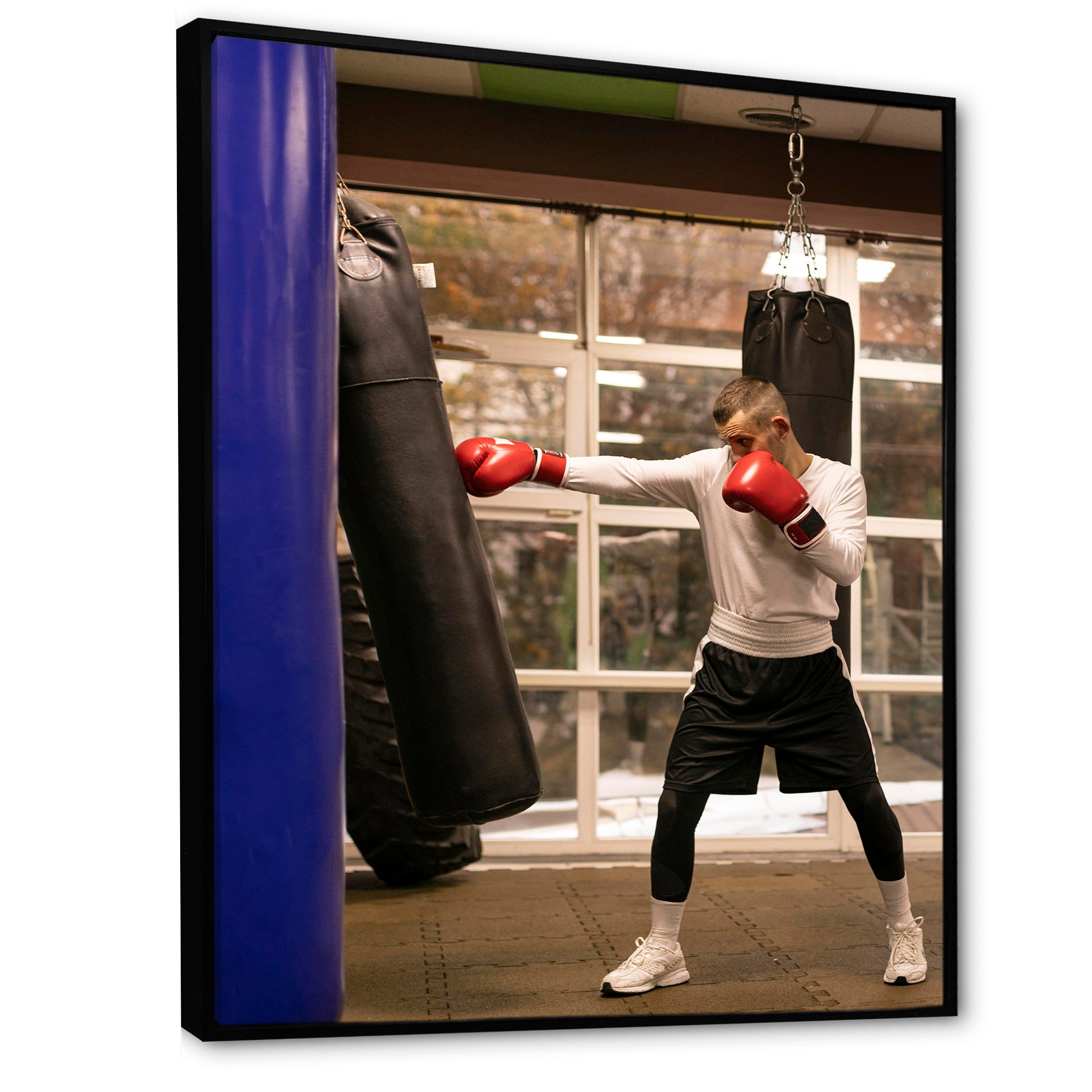 Side View Boxer Of Practicing With Punching Bag - Sport Boxer Canvas Wall Art