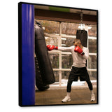 Side View Boxer Of Practicing With Punching Bag - Sport Boxer Canvas Wall Art