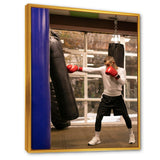 Side View Boxer Of Practicing With Punching Bag - Sport Boxer Canvas Wall Art