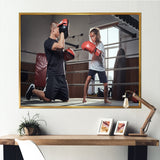 Young Trainer Training A Little Girl Boxer - Sport Boxer Canvas Wall Art
