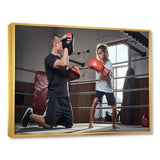 Young Trainer Training A Little Girl Boxer - Sport Boxer Canvas Wall Art