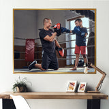 Young Trainer Training A Little Boy Boxer - Sport Boxer Canvas Wall Art