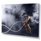 Tattooed Bearded Male Exercising - Aerobic & Bodybuilding Canvas Wall Art