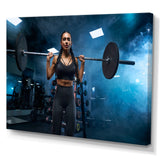 Woman Holding Barbell On Shoulders - Aerobic & Bodybuilding Canvas Wall Art