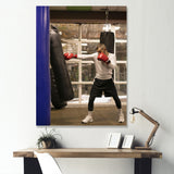 Side View Boxer Of Practicing With Punching Bag - Sport Boxer Canvas Wall Art