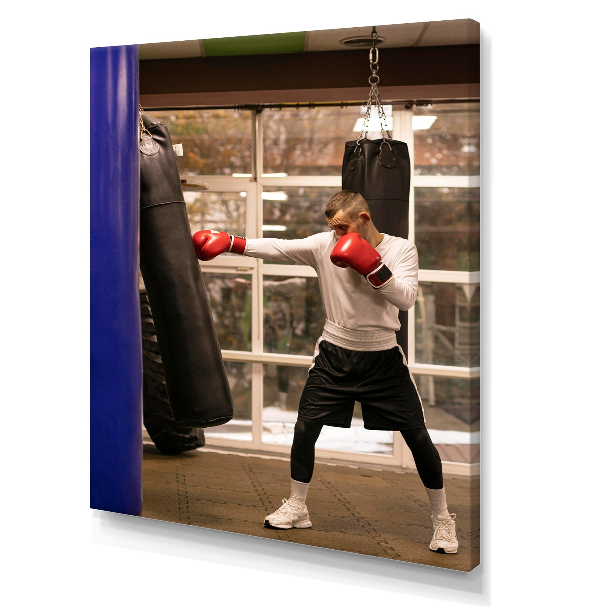 Side View Boxer Of Practicing With Punching Bag - Sport Boxer Canvas Wall Art