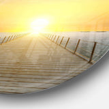 Ocean Sunset with Pier - Sea & Shore Circle Metal Wall Decor