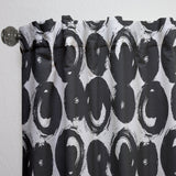 Curtain with black abstract circular pattern on a white background