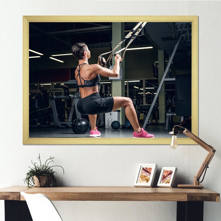 Athletic Woman Working Out With TRX Suspension Strips - Aerobic &amp; Bodybuilding Canvas Wall Art