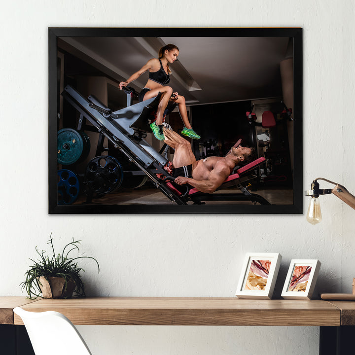 Man Doing Leg Presses With His Trainer - Aerobic &amp; Bodybuilding Canvas Wall Art