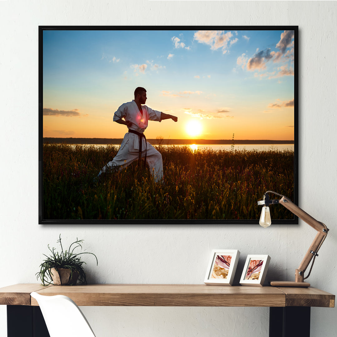 Man Training Karate In Field At Sunrise - Aerobic &amp; Bodybuilding Canvas Wall Art
