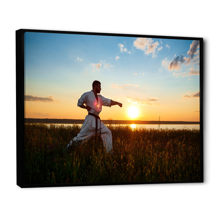 Man Training Karate In Field At Sunrise - Aerobic &amp; Bodybuilding Canvas Wall Art