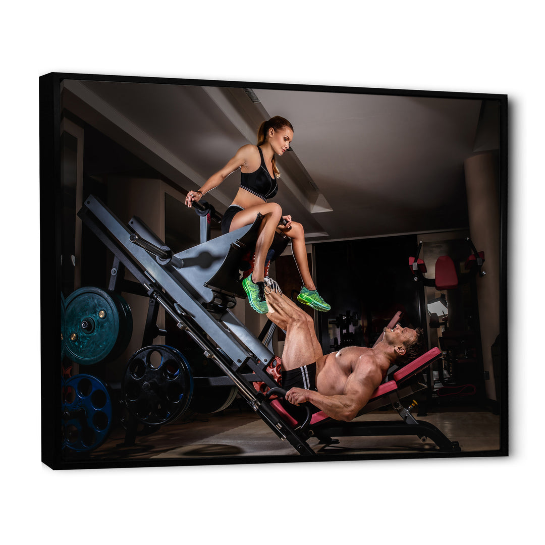 Man Doing Leg Presses With His Trainer - Aerobic &amp; Bodybuilding Canvas Wall Art