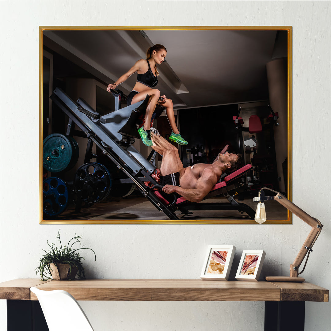 Man Doing Leg Presses With His Trainer - Aerobic &amp; Bodybuilding Canvas Wall Art