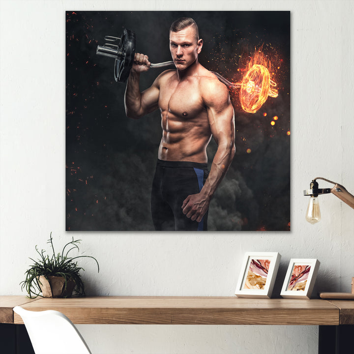 Muscular Athletic Male Holds Burning Barbell - Aerobic &amp; Bodybuilding Canvas Wall Art