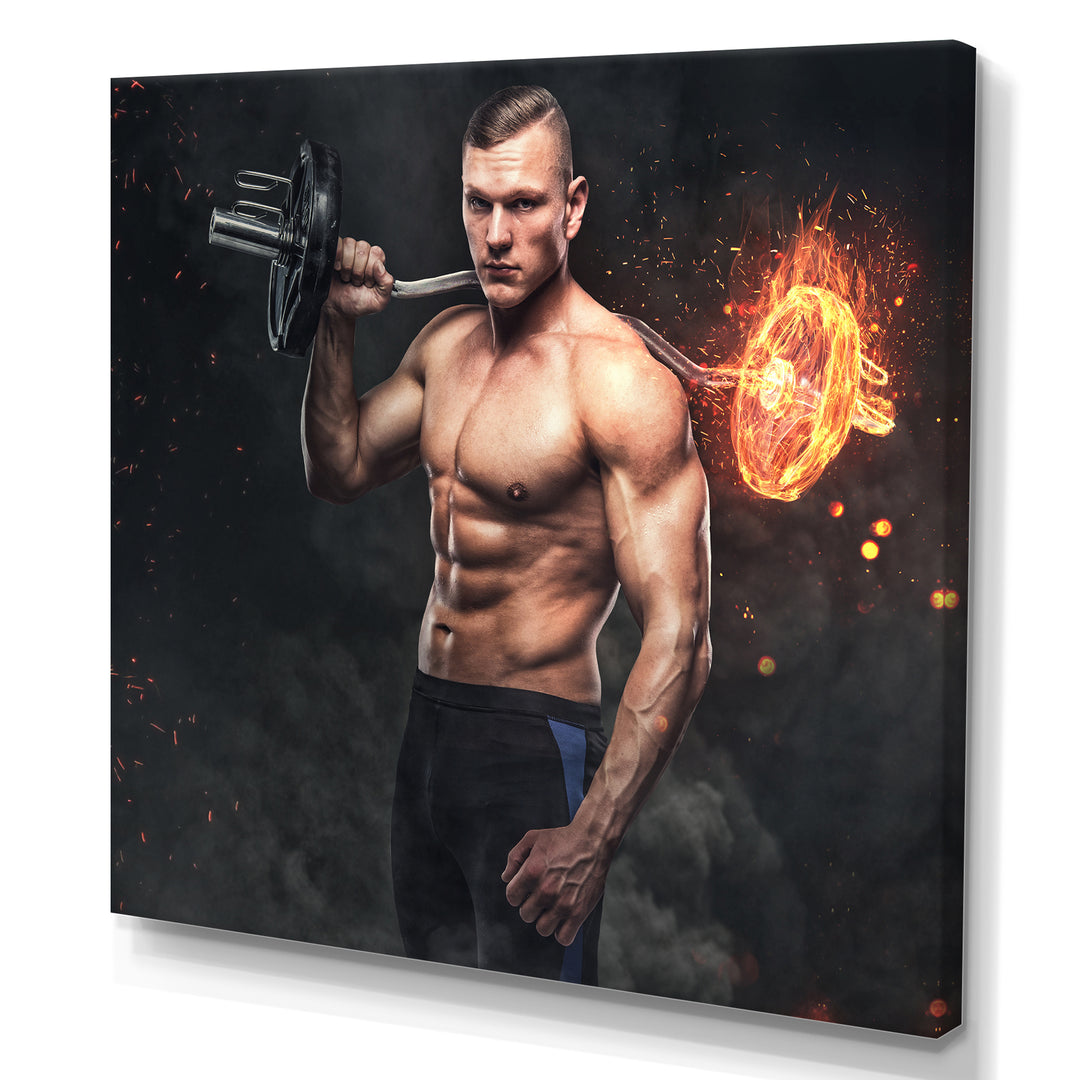 Muscular Athletic Male Holds Burning Barbell - Aerobic &amp; Bodybuilding Canvas Wall Art