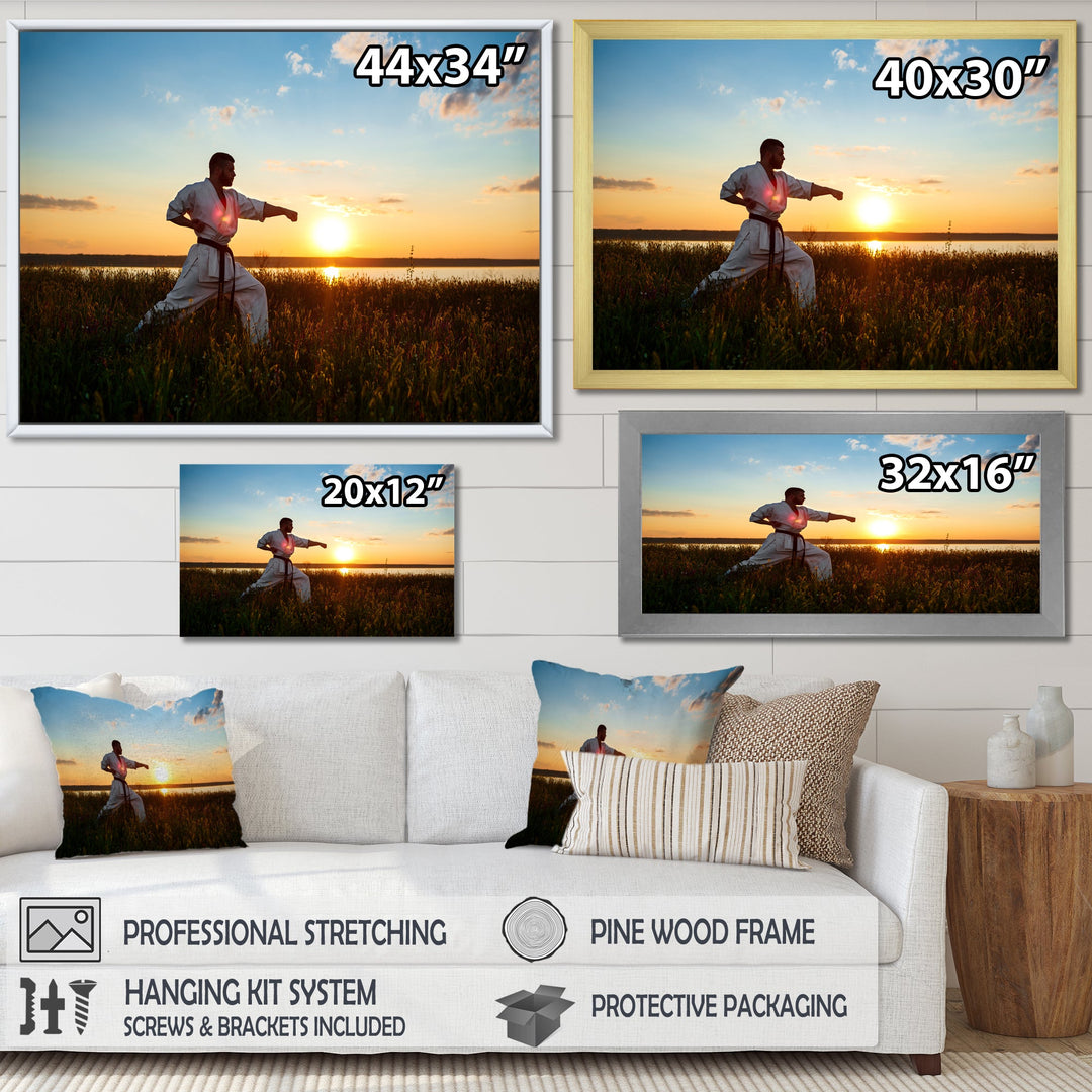 Man Training Karate In Field At Sunrise - Aerobic &amp; Bodybuilding Canvas Wall Art