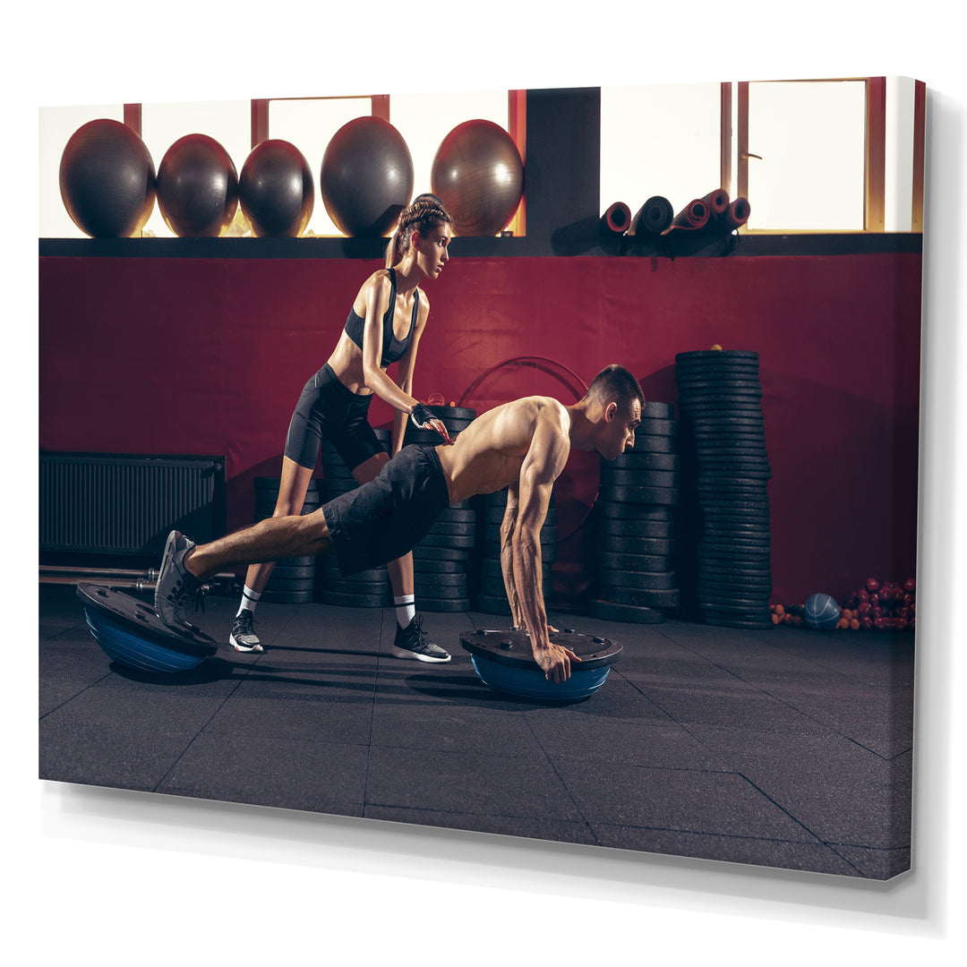 Athletic Man Woman With Dumbbells - Aerobic &amp; Bodybuilding Canvas Wall Art