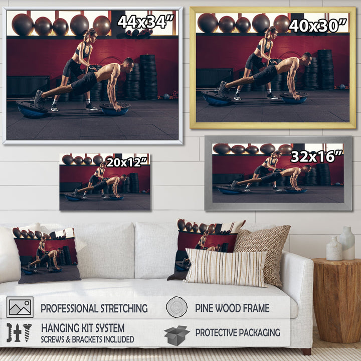 Athletic Man Woman With Dumbbells - Aerobic &amp; Bodybuilding Canvas Wall Art