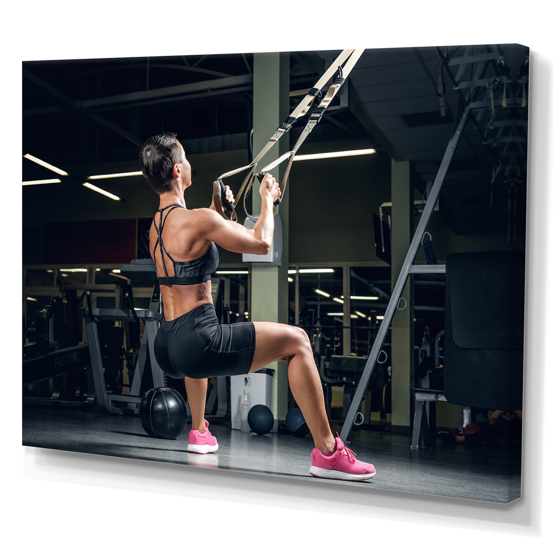 Athletic Woman Working Out With TRX Suspension Strips - Aerobic &amp; Bodybuilding Canvas Wall Art