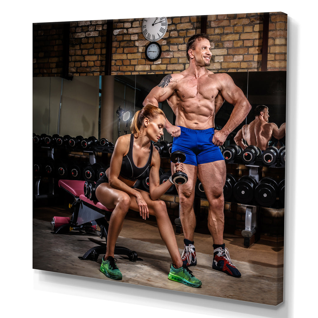 Sports Couple Is Working Out Gym - Aerobic &amp; Bodybuilding Canvas Wall Art