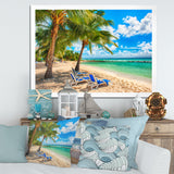 Blue chairs at the tropical white sand beach