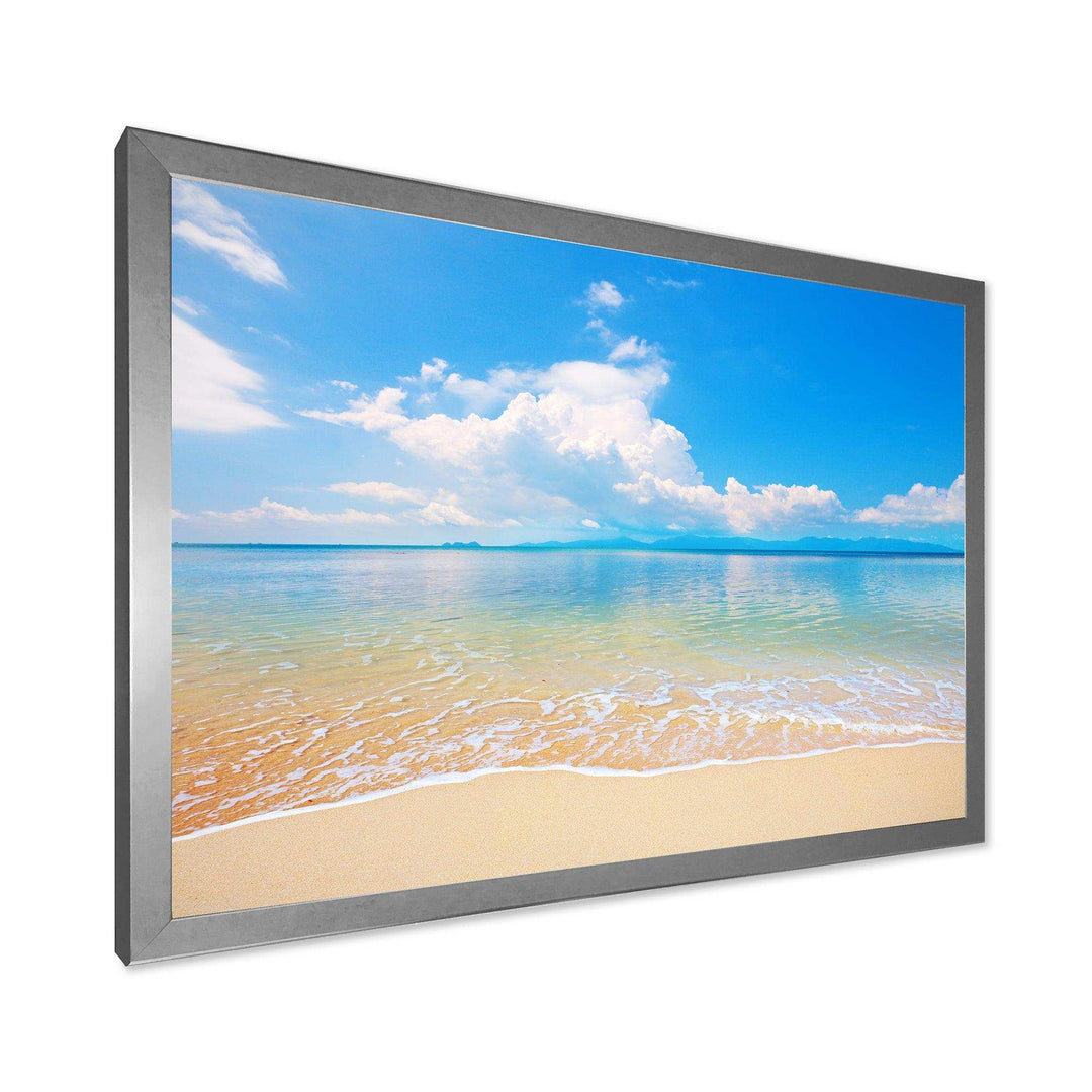 Large Clouds Over Calm Beach