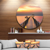 Yellowish Sky and Long Wooden Bridge Pier Seascape Metal Circle Wall Art