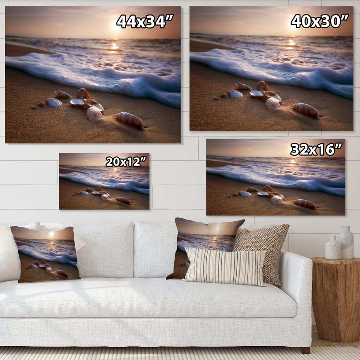 Waves Approaching Seashells on Sand
