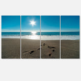 Blue Sea and Footprints in Sand Multi-Panels