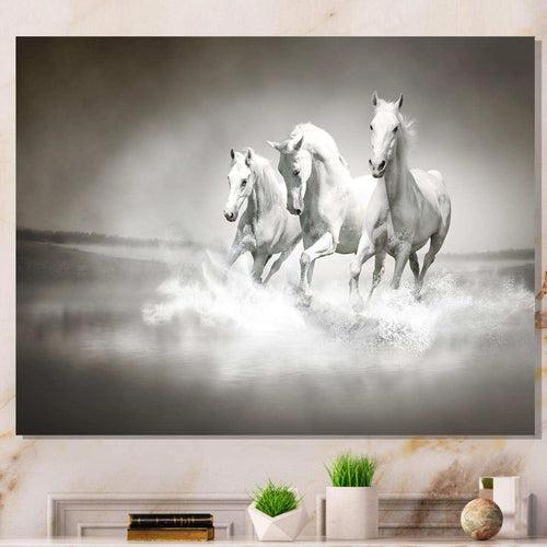 Horses Running Through Water