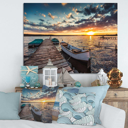 Boats and Jetty under Dramatic Sky
